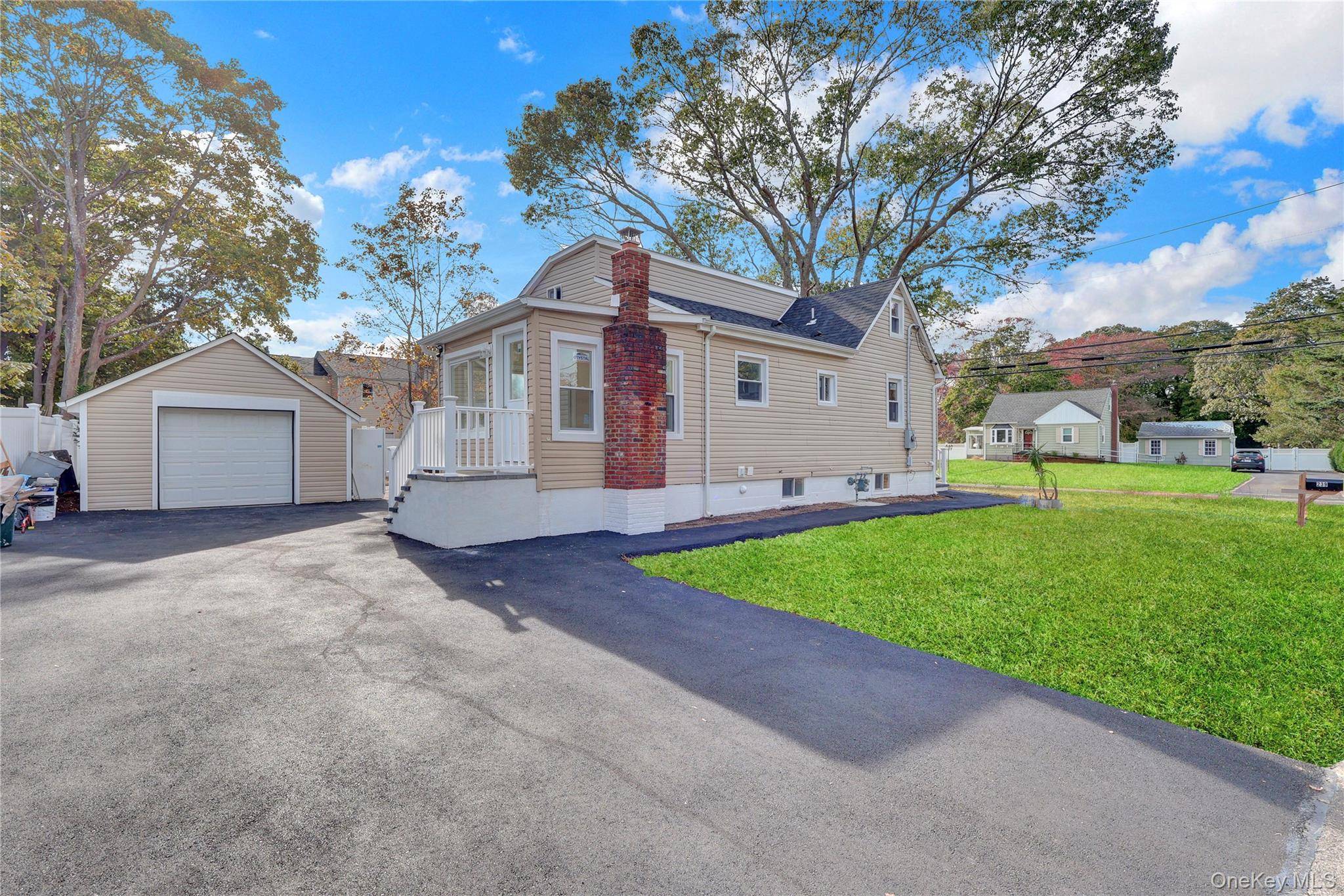 Beautiful Fully Renovated Home, corner property, Very Low Taxes, New Roof, New Central Air and gas system, Full basement.