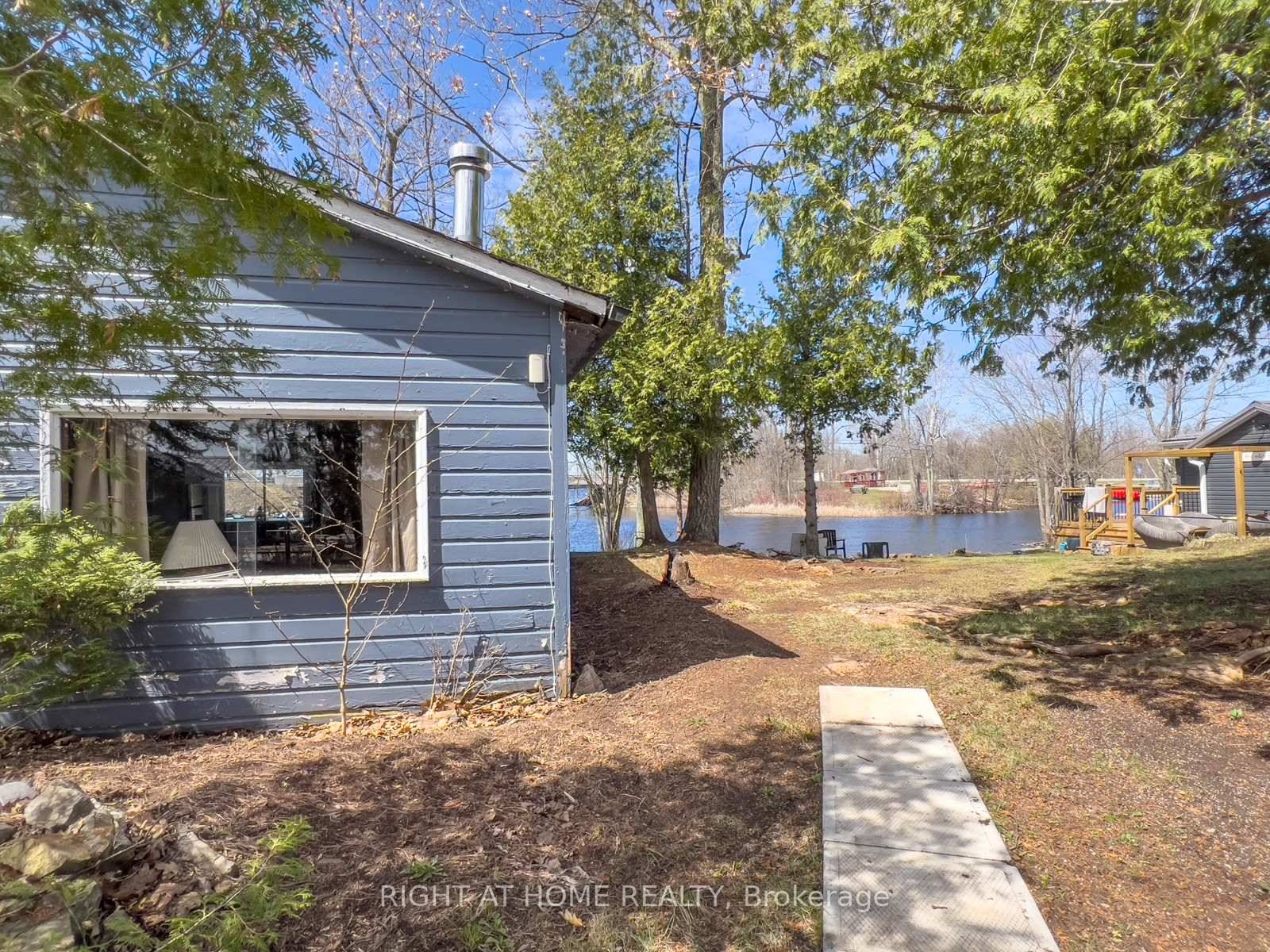Imagine owning your very own island retreat, one of just seven cottages on this quiet stretch of Moira Lake, where the privacy is absolute thanks to a picturesque footbridge access ...