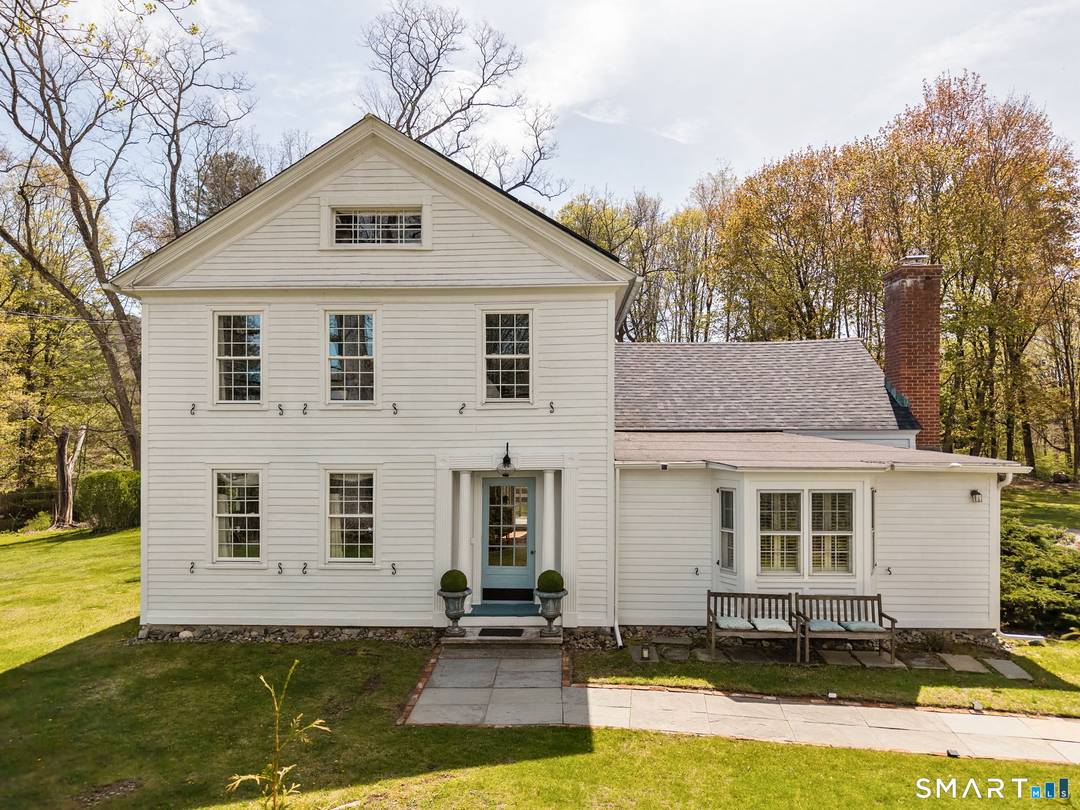 Meet Madeline. This historic 1840 New England farmhouse is an understated, in town masterpiece that immediately establishes a profound sense of place.