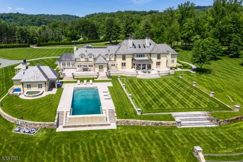 Discover the pinnacle of luxury living in this exquisite 6 bedroom French country estate, set on 11 unparalleled acres.