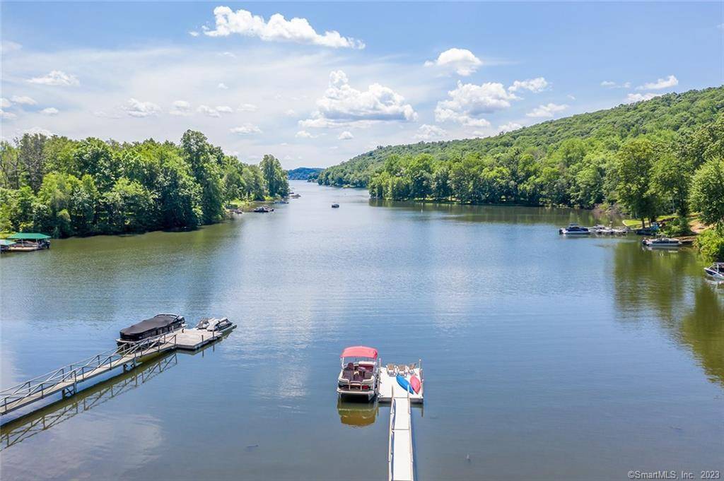 Privately set, Sail Harbour Waterfront offers enticing south exposure, multi level decks w glass rails for unobstructed views, terraced gardens w intimate seating in an idyllic 1.
