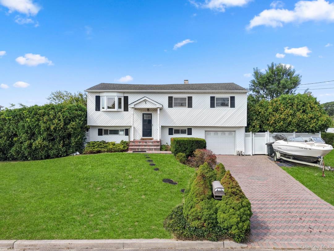 Welcome to this fully renovated 5 bedroom, 2 bathroom high ranch, offering both style and functionality.