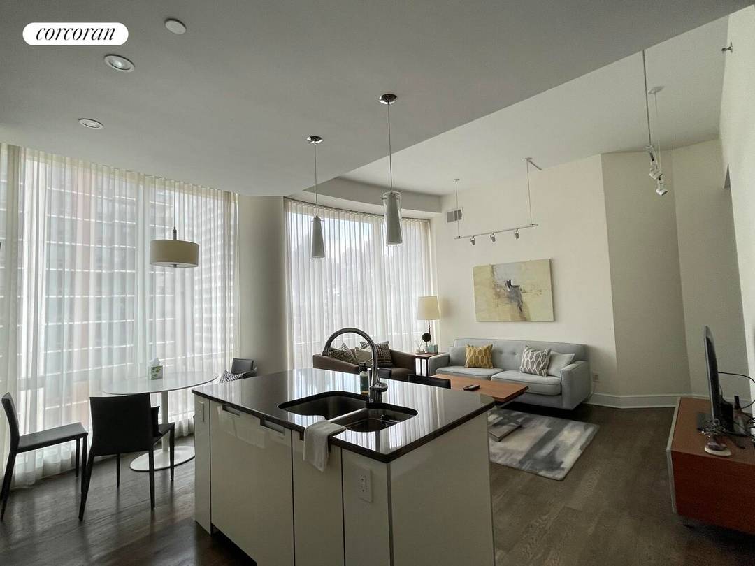 Experience unmatched luxury in this stunning and sun drenched high floor 2 bed 2 bath residence at 250 East 49th Street, known as The Alexander.