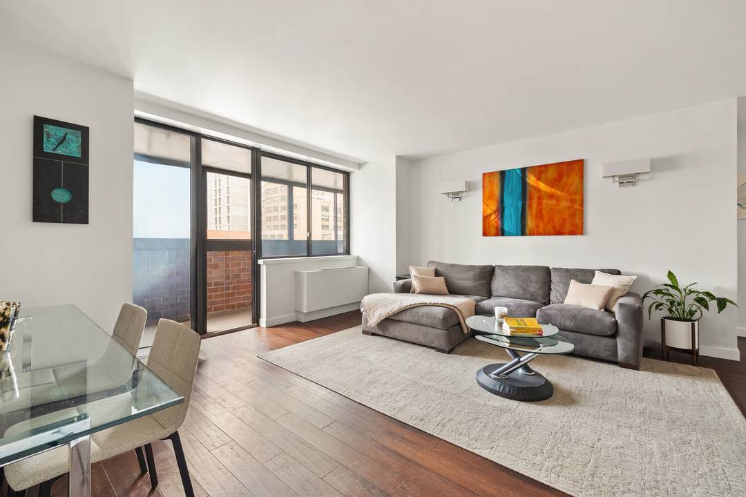 Perched high above the Upper East Side, Residence 11C offers a beautifully renovated, split two bedroom, two bathroom home with modern upgrades, a spacious enclosed terrace, and exceptional year round ...