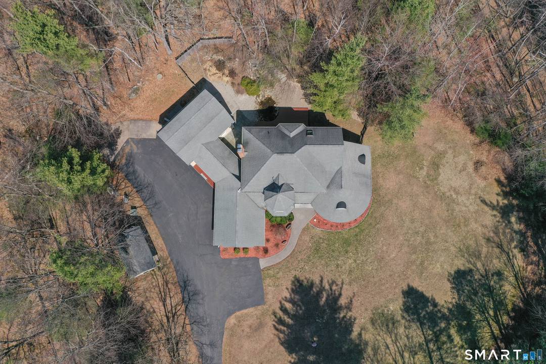 This custom built neo Victorian home offers classic charm, modern updates, and unparalleled privacy.