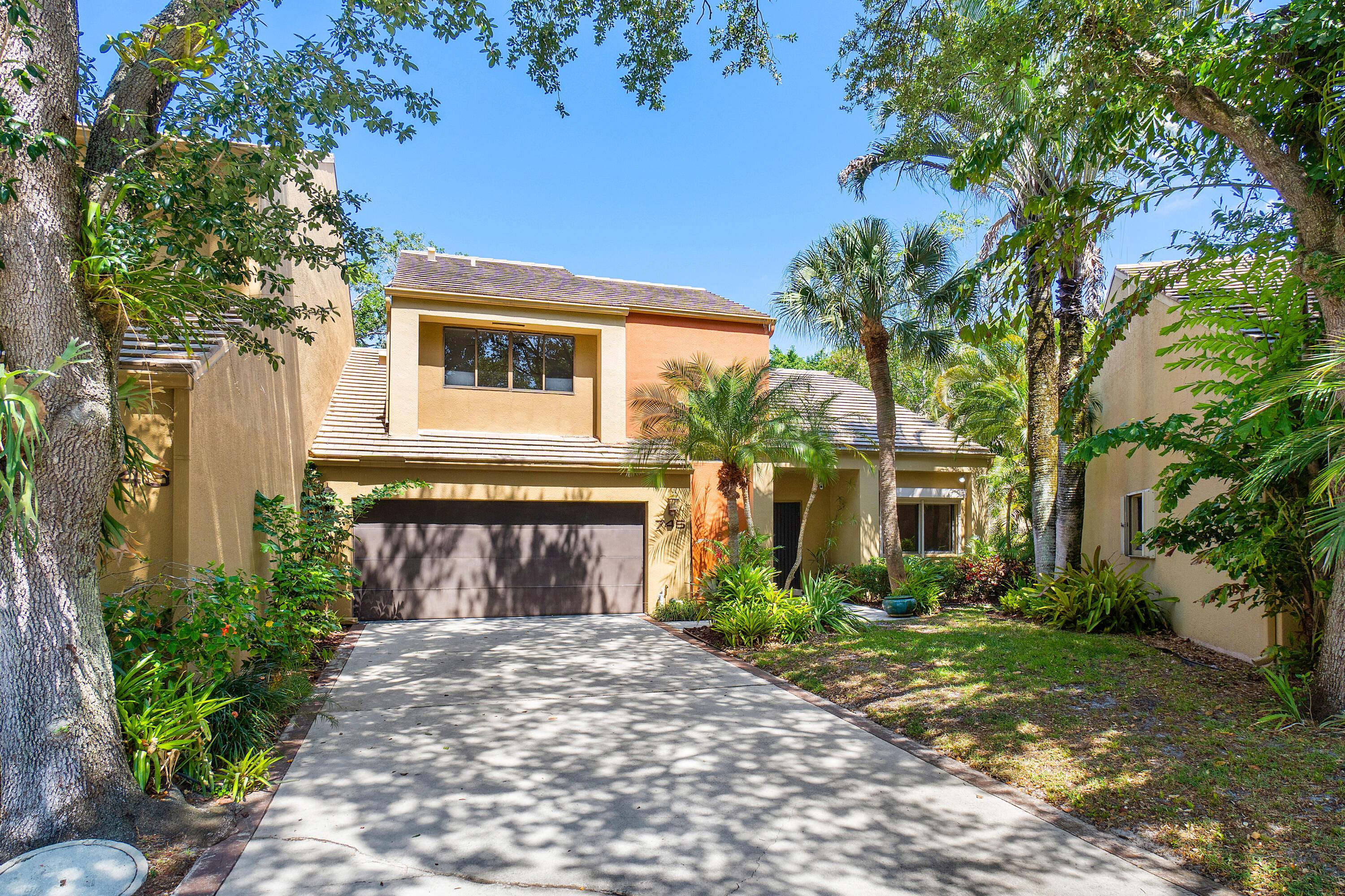 Nestled in a tranquil community in East Boca Raton, this two level townhome offers an ideal blend of convenience and serenity.