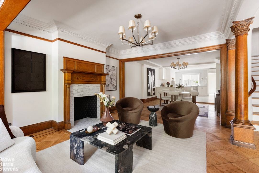 Every detail of this meticulously renovated massive Strivers' Row townhouse blends timeless historic character with modern sophistication, creating a truly extraordinary home.