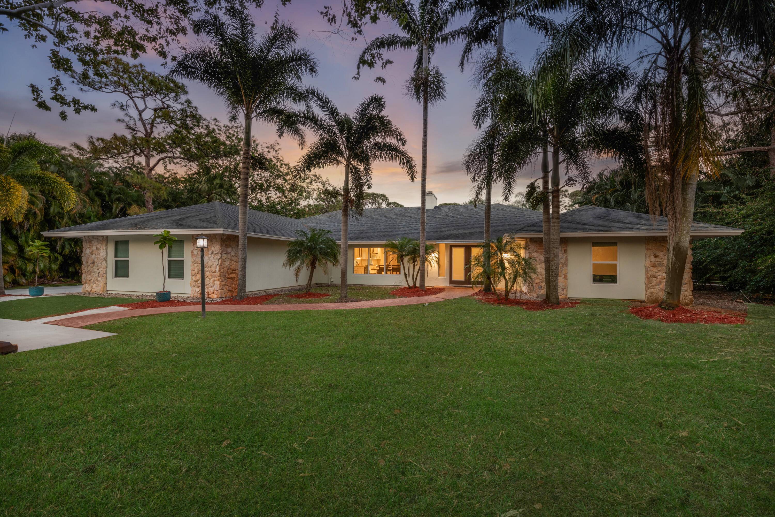 Don't miss the opportunity to own a flawlessly renovated custom home in the highly desirable Imperial Woods neighborhood of Jupiter.