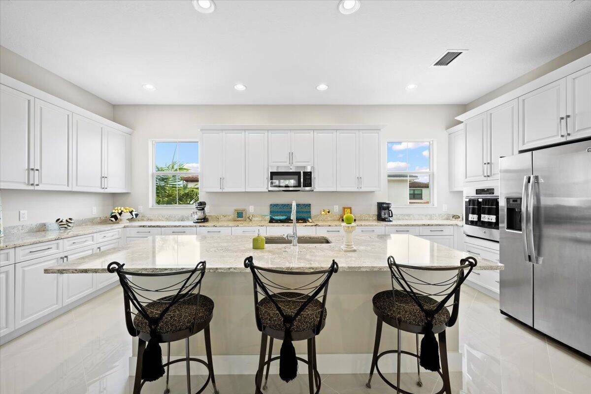 Like new townhome in Alton's preferred low density first phase, furthest from the interstates.