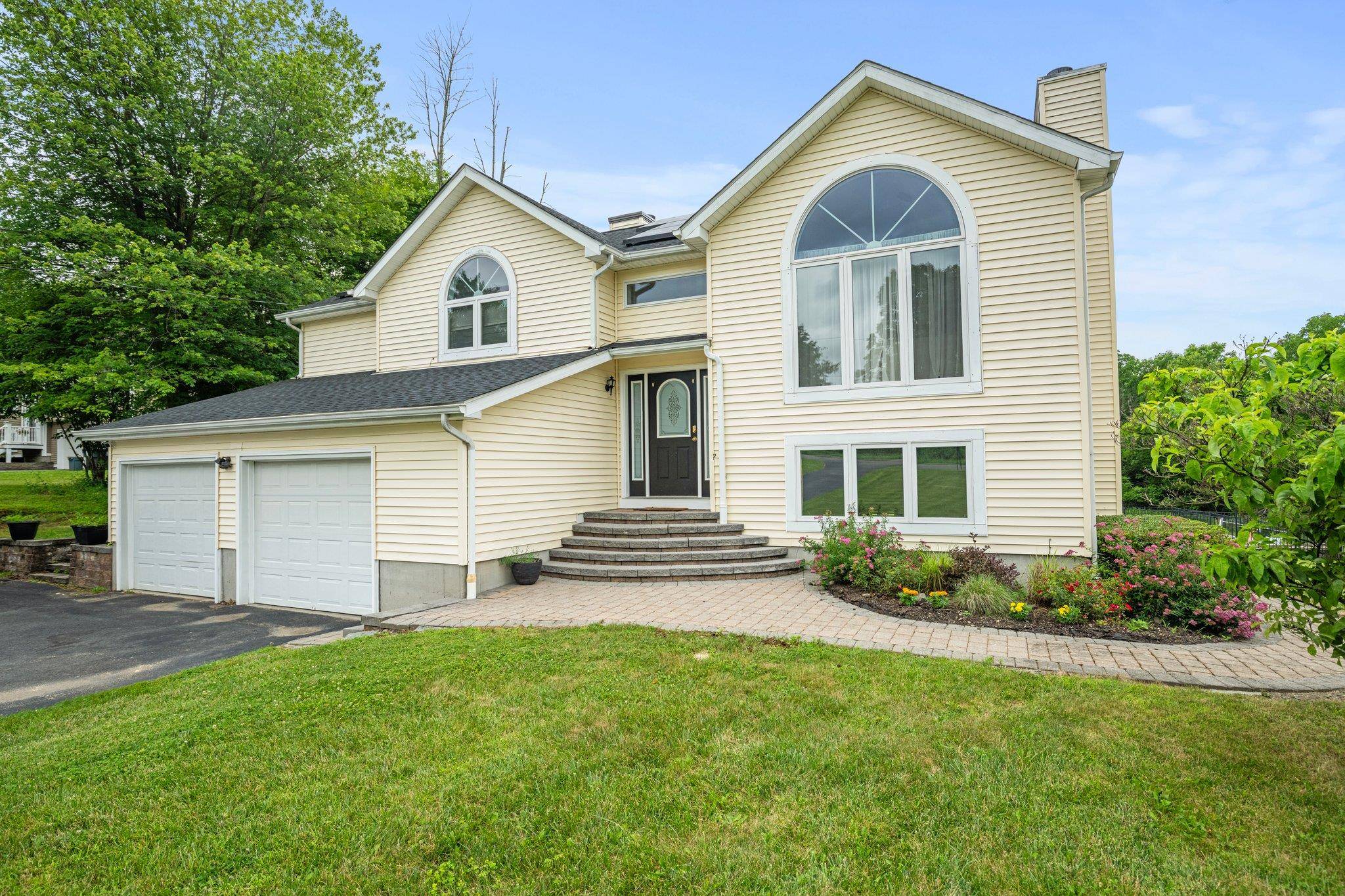 Discover the perfect blend of serenity and comfort in this stunning 4 bedroom, 3 bathroom raised ranch nestled on a sprawling 1.