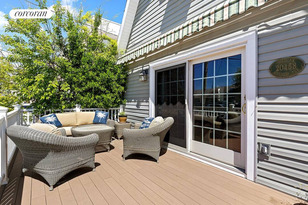 Welcome to 204 58 7th Avenue, a Rockaway Point three bedroom, three bath home featuring private parking, expansive outdoor spaces, and a thoughtful floor plan.