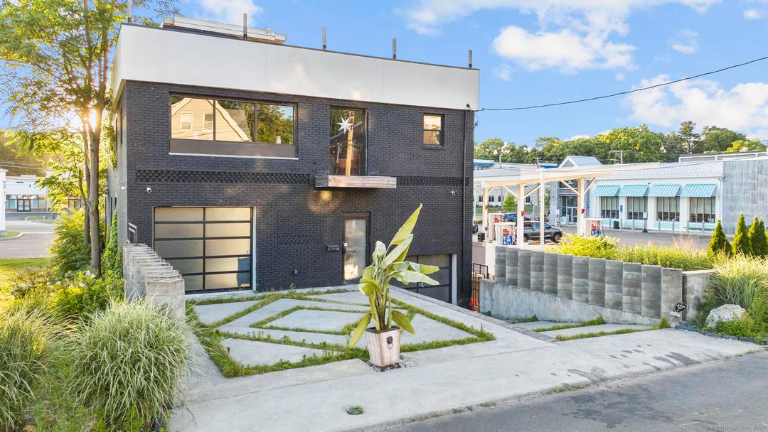 In the heart of Hamden's emerging commercial corridor, 12 Victor Street stands as a bold architectural statement a modern black brick structure reimagined for today's visionary operator.