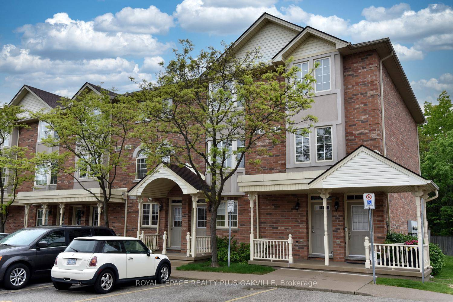 Welcome Home to this bright, spacious, and beautifully updated townhome with low condo fees, tucked away in a quiet enclave of the sought after South of the Green complex in ...