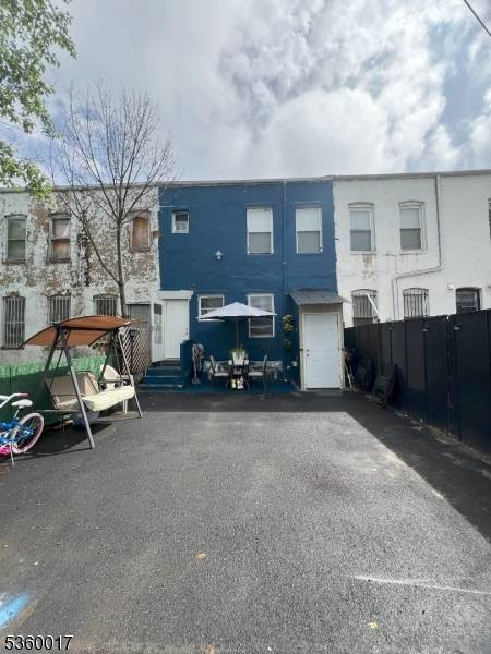 Welcome to 493 1 2 Avon Ave, Newark, NJ a beautifully updated half duplex townhome offering the perfect blend of modern style, functionality, and unbeatable convenience.