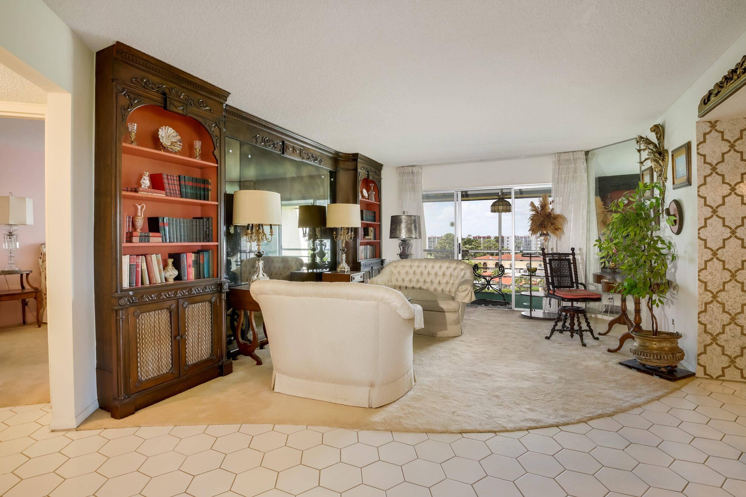 WELCOME TO THIS TOP FLOOR CONDO IN THE POPULAR POINCIANA COMMUNITY.