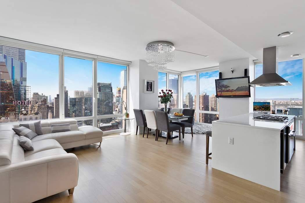 Perched high in the highly sought after Platinum Condominium, this coveted southwest facing corner residence offers an exceptional blend of luxury, privacy, and panoramic city views.