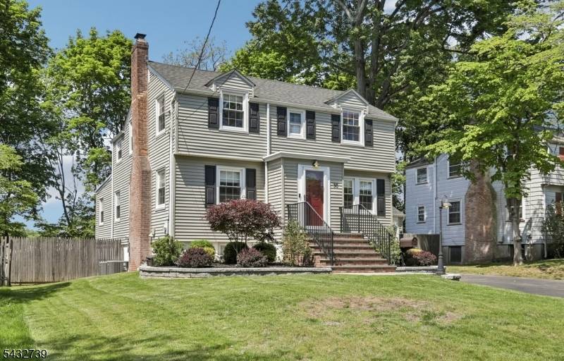 Nestled in the desirable Broadlawn section of Livingston, this charming 1930's Center Hall Colonial beautifully blends timeless character with thoughtful modern updates.