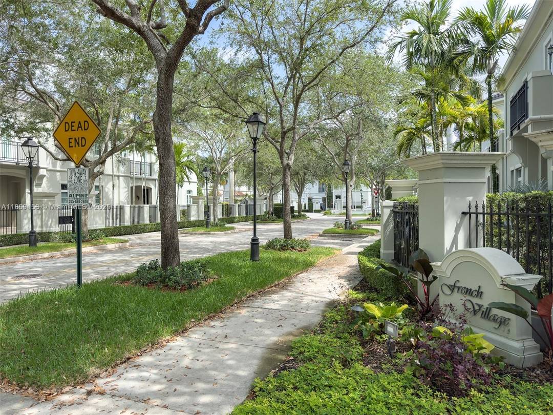 Elegant 4BR 4. 5BA villa in Pinecrest s exclusive 12 home French Village, blending French neoclassical design with refined finishes.