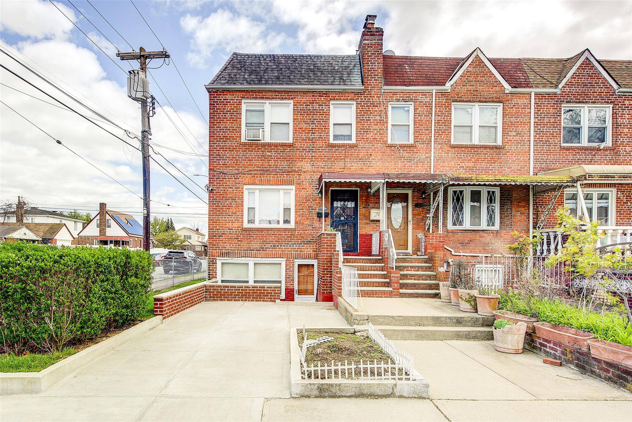 Charming colonial style home located at 225 54 Murdock Avenue in the desirable Queens Village neighborhood of New York.