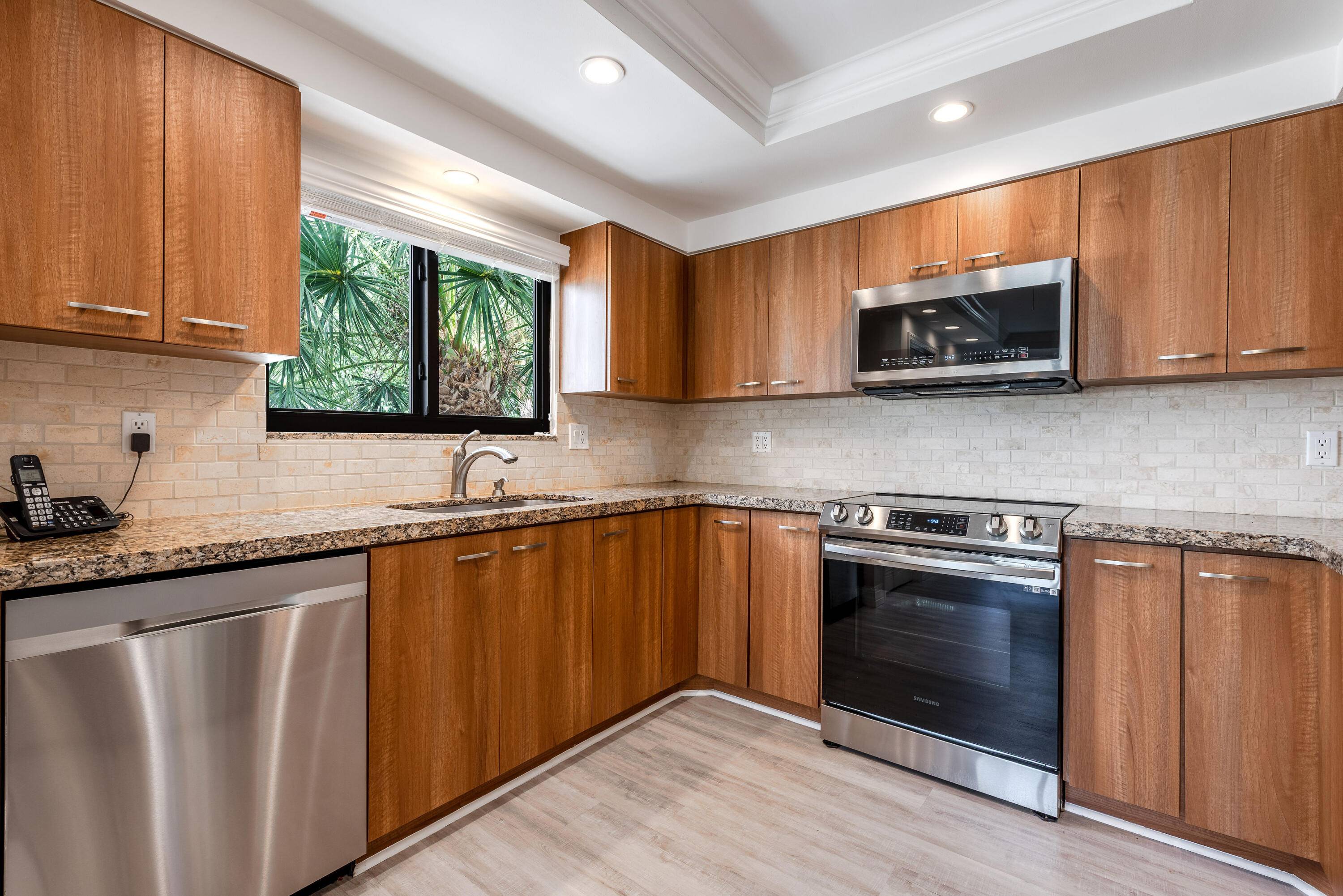 Discover modern living at its finest in this beautifully renovated 2 bedroom plus den 2 tastefully remodeled bathrooms, impact windows, updated plumbing, spacious living area and kitchen boasts modern finishes ...