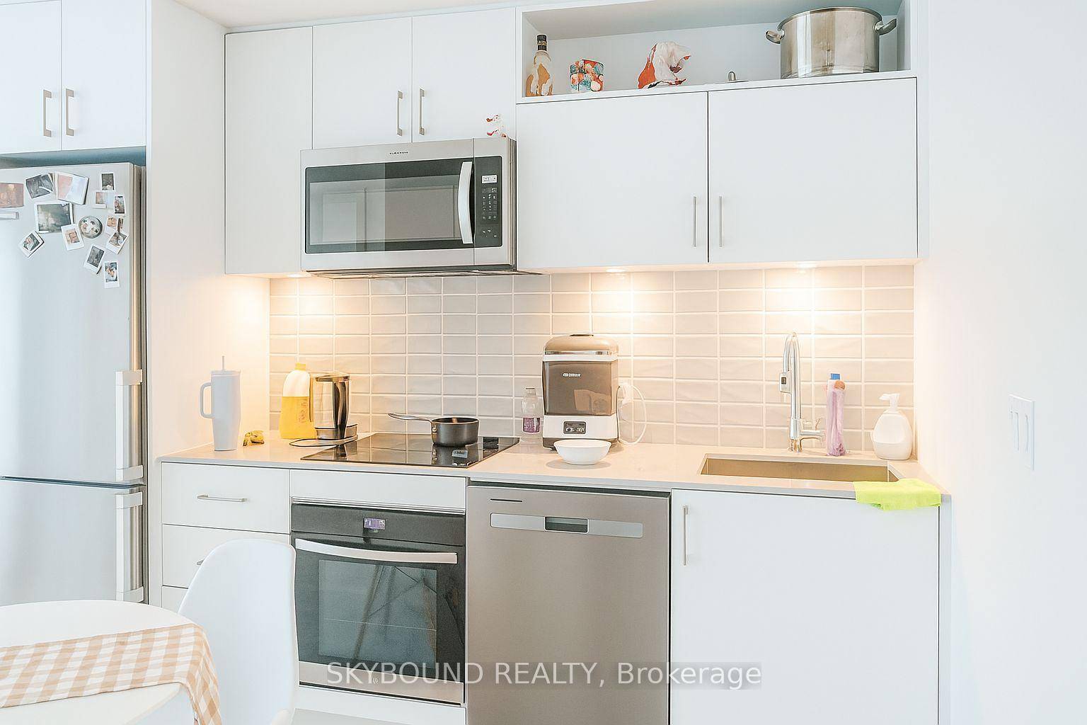 Modern 1 den condo at 70 Princess Street, Suite 2411 bright, sleek, and priced to sell.