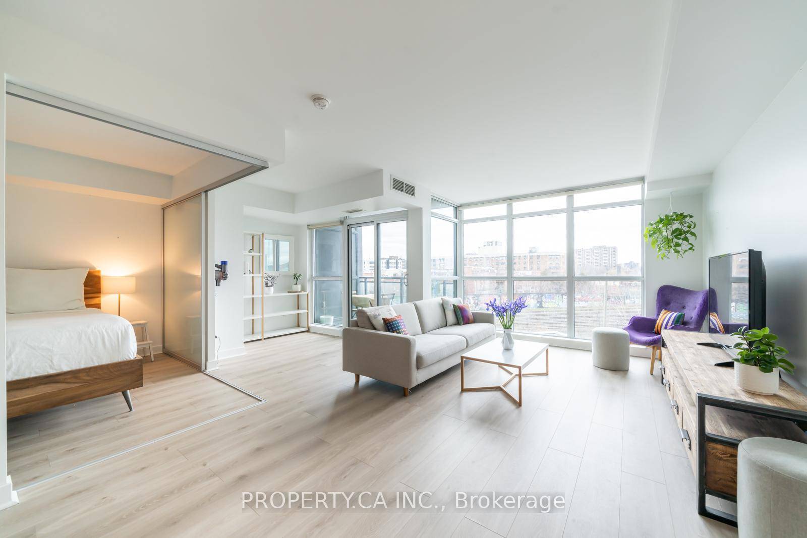 Experience the vibrant spirit of Queen West living !