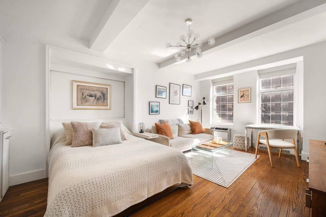 London Terrace Studio with hardwood floors and Eastern exposure with great light.