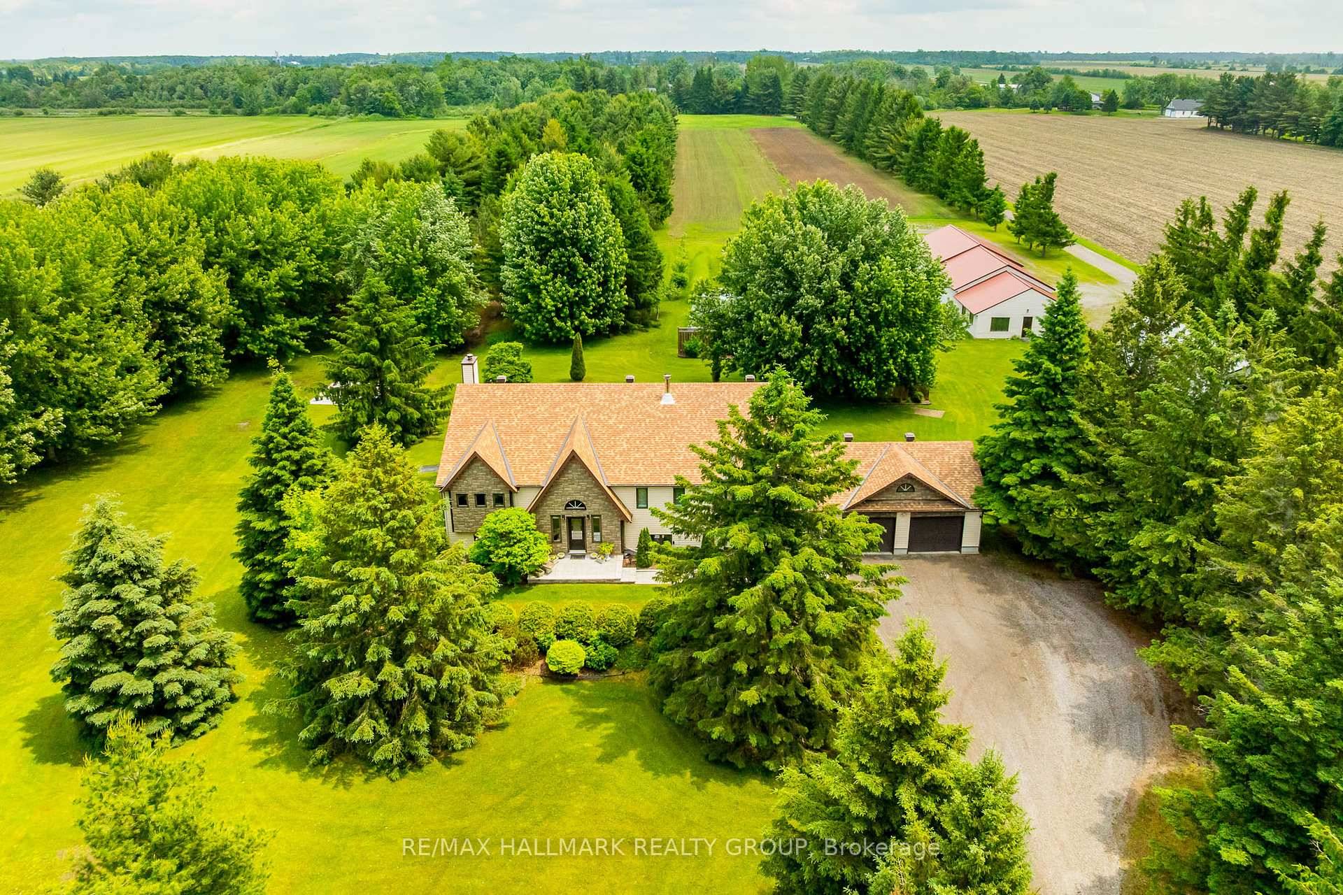 Nestled on approximately 24 acres of mature, treed landscape, this stunning custom built 3 bedroom home offers the perfect balance of comfort, space, and opportunity.