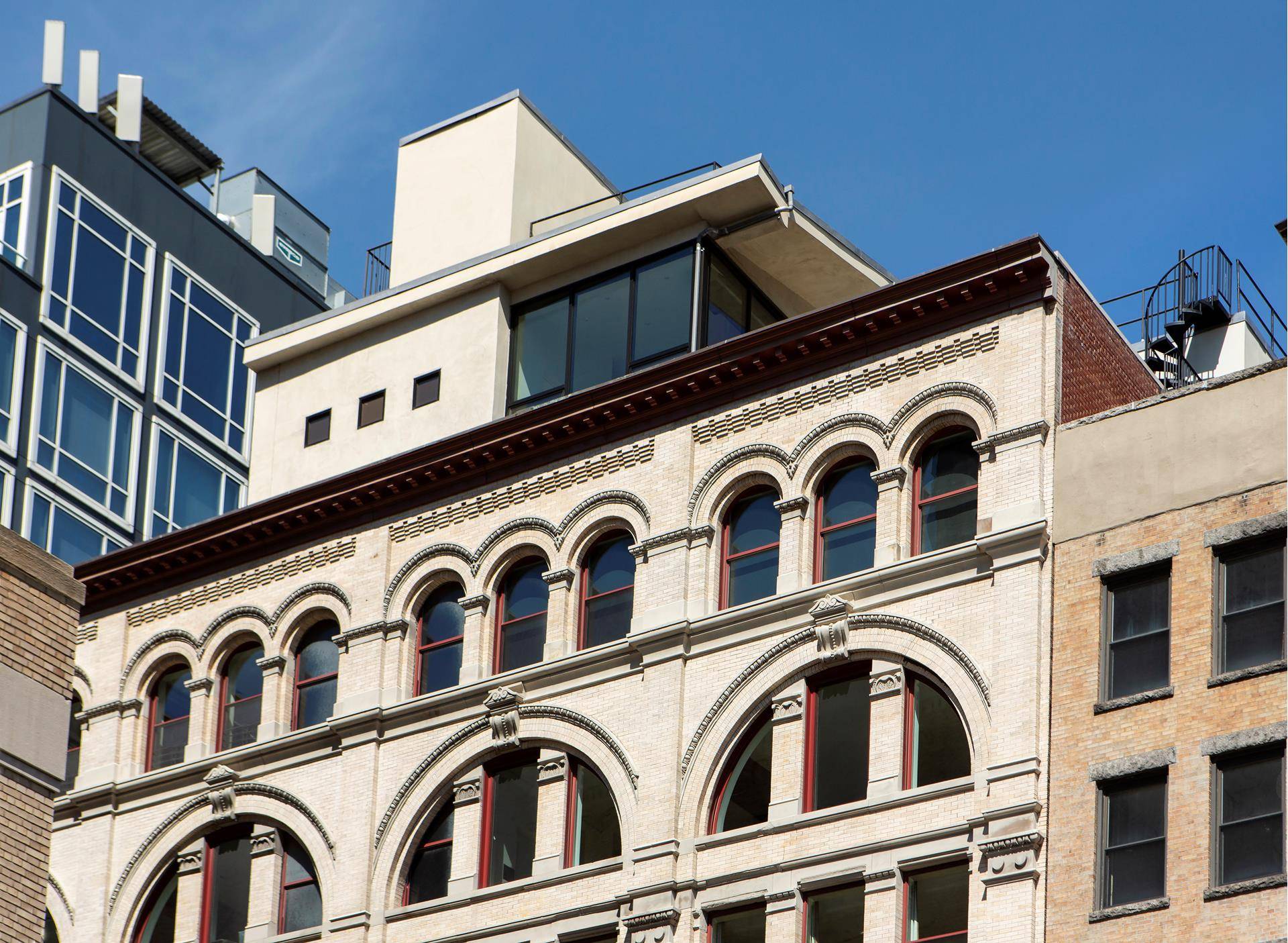 Trophy PH with expansive terraces overlooking the Hudson River in recently converted Beaux Arts Spice Warehouse condominium.