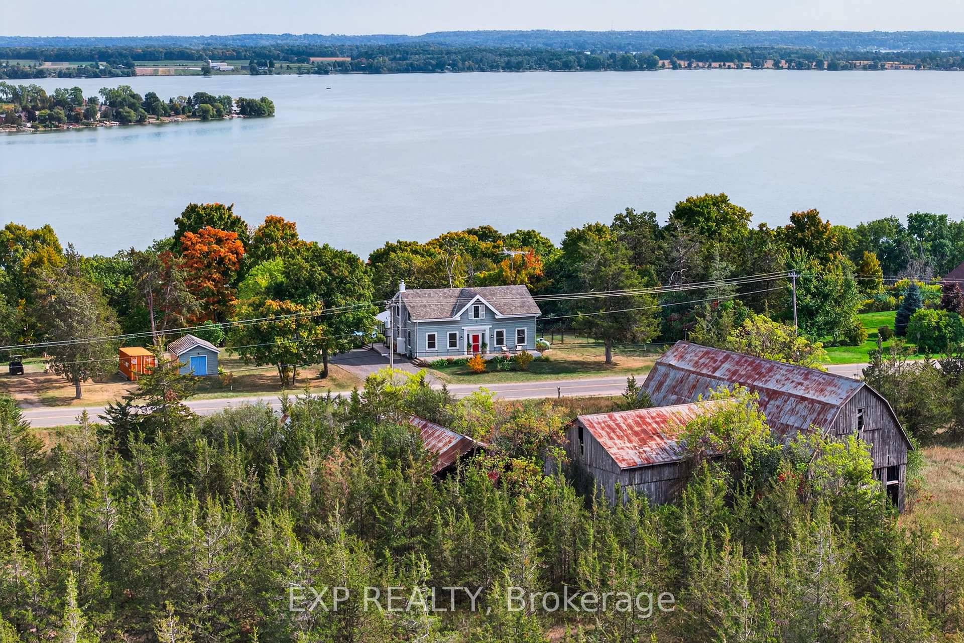 One of Prince Edward County's most coveted waterfront estates over 9 acres of pristine land with more than 740 feet of private shoreline and.
