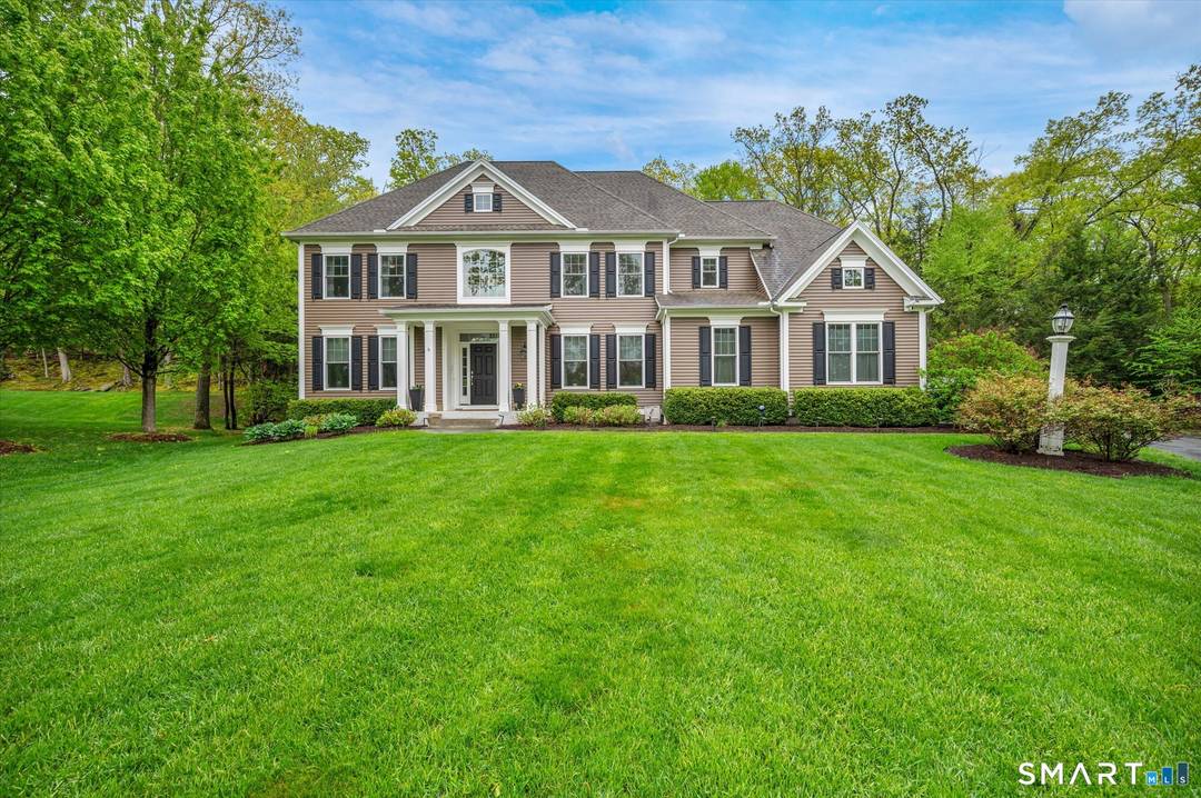 Welcome to 16 Sweetheart Mountain Road, a beautifully built 4 bedroom, 3.