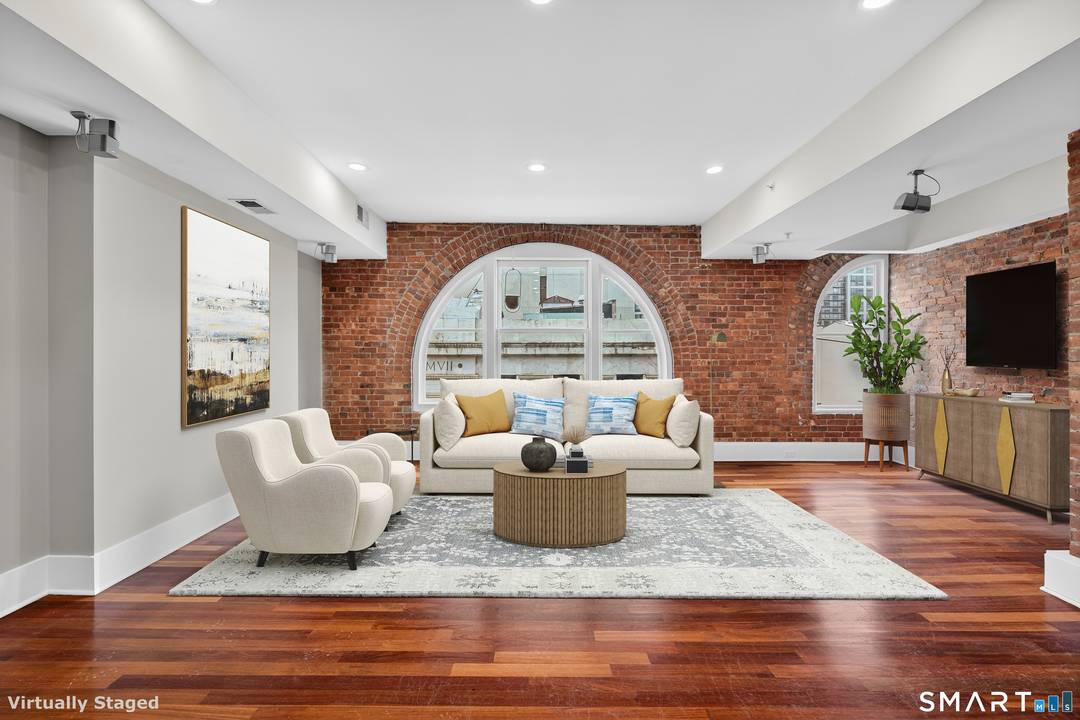 Exciting opportunity to own a Downtown New Haven loft condo at sought after 116 Crown Street.