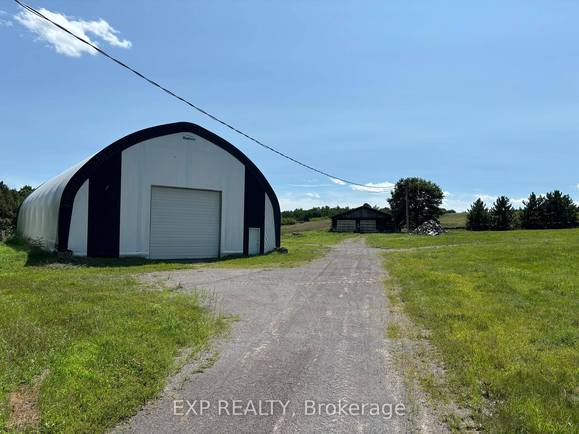 11 acre property which features a 50 ft x 80 ft approx.