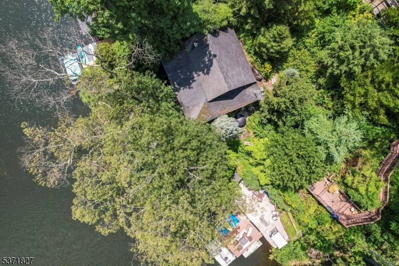 Bring your contractor and your imagination to transform this charming 3 bedroom, 1 bathroom Ranch nestled on the shores of Glen Wild Lake.