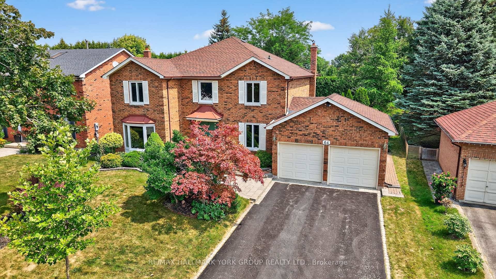 Lake Wilcox Family Home 4 1 Bedroom 4 Bathroom Home on large mature 65' x 131' lot featuring a spacious driveway and a full two car garage.