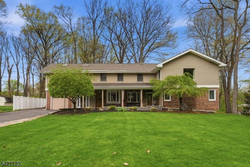 Experience this MASSIVE Colonial Expanded Ranch residence situated in highly sought after White Meadow Lake community within walking distance to your very own private Beach and just 1 hour to ...