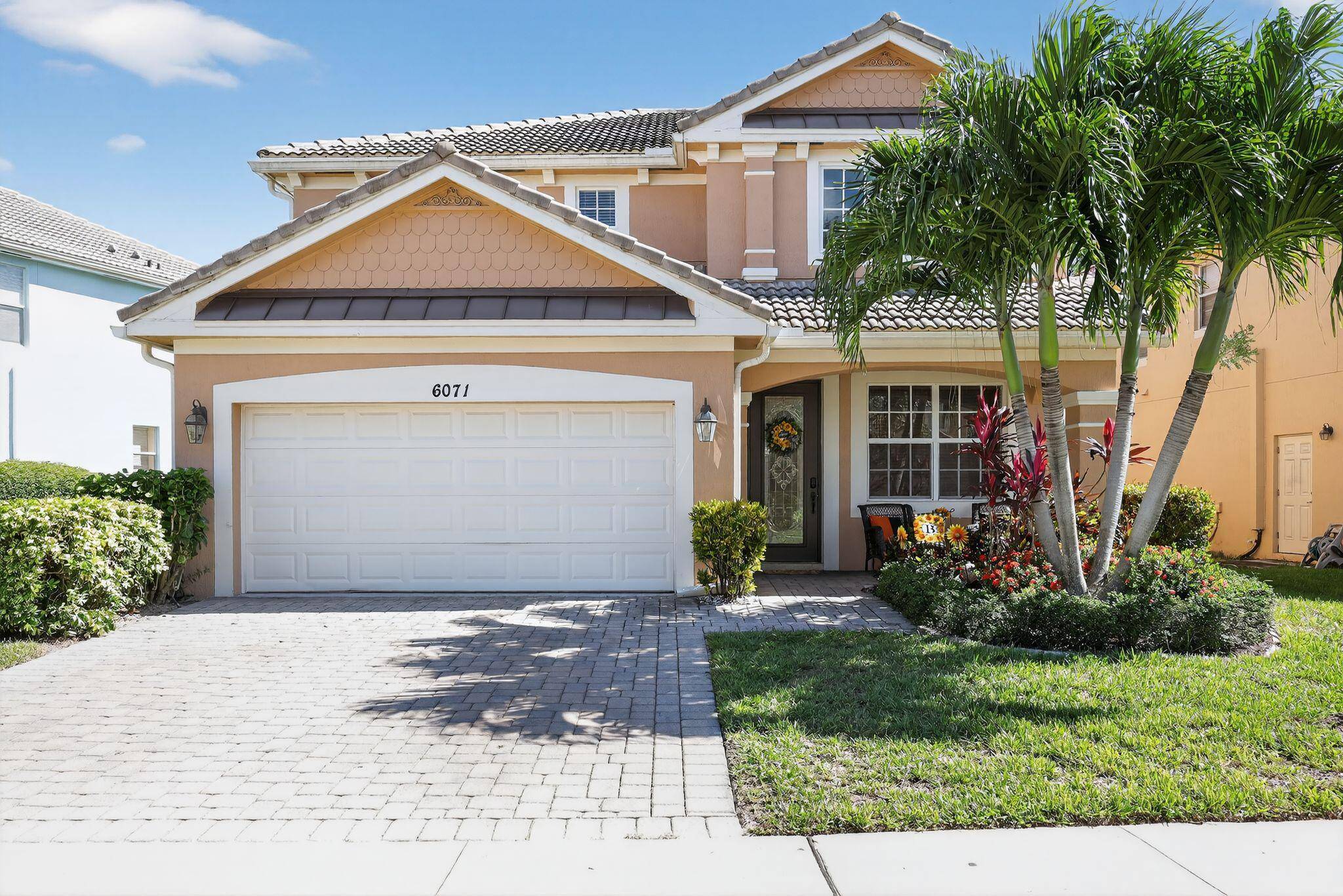 Welcome to this beautifully maintained 4 bedroom Newport model located in a gated community offering privacy and peace of mind.