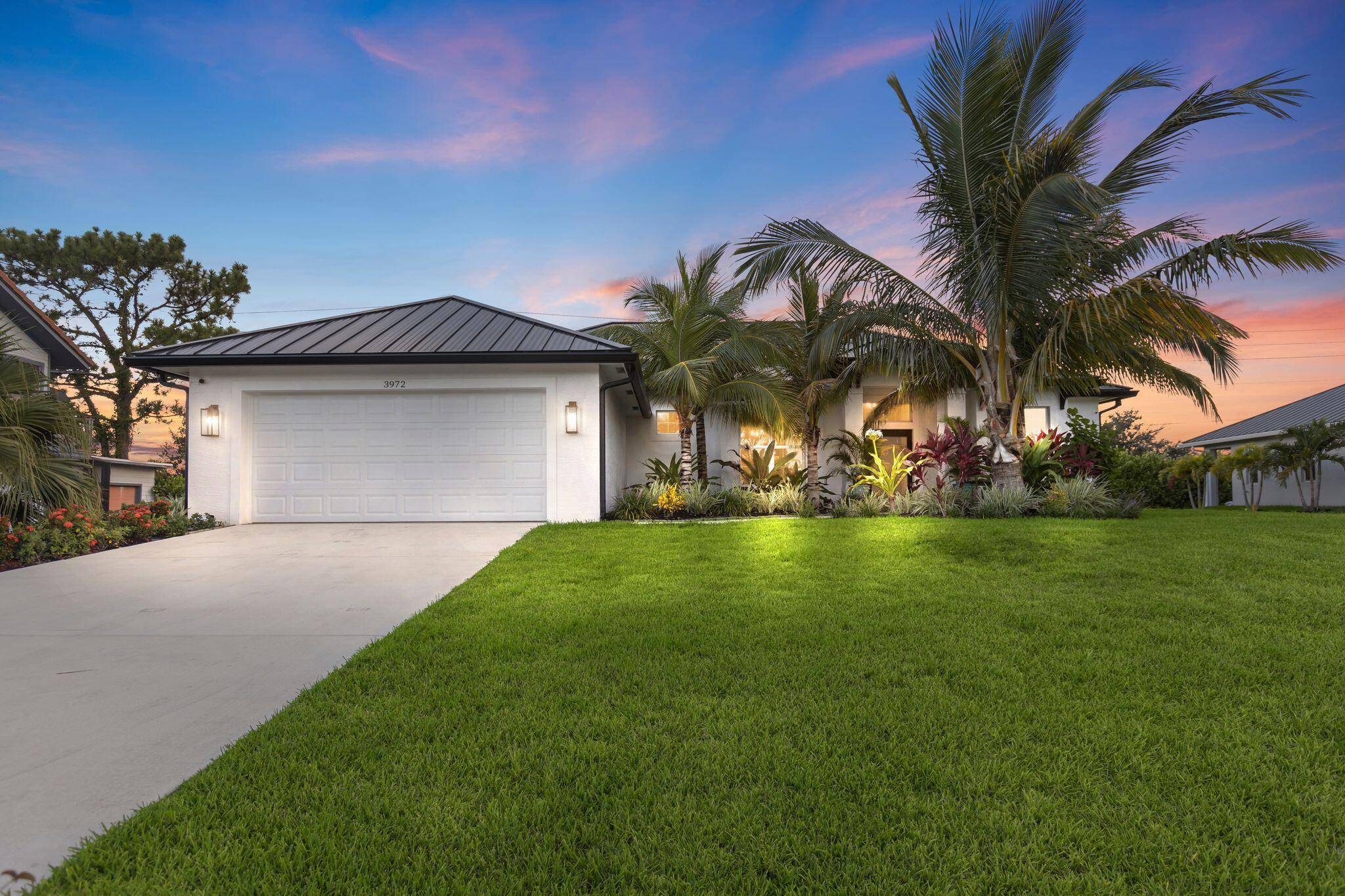 Built in 2022, this Concrete Block home with Metal Roof Impact Windows, has 4 nice sized Bedrooms, 2.