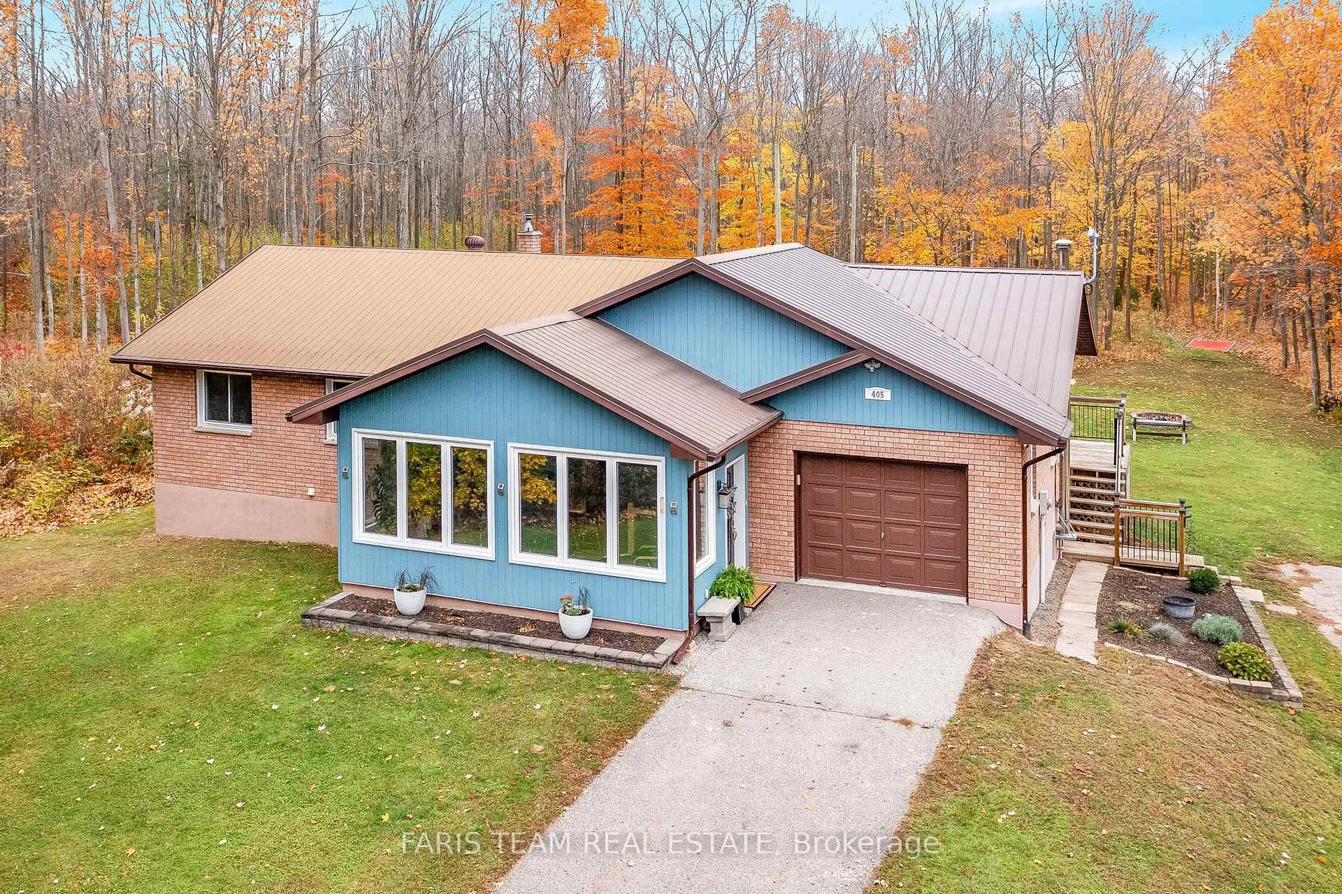 Top 5 Reasons You Will Love This Home 1 Ranch bungalow set on a private 3.
