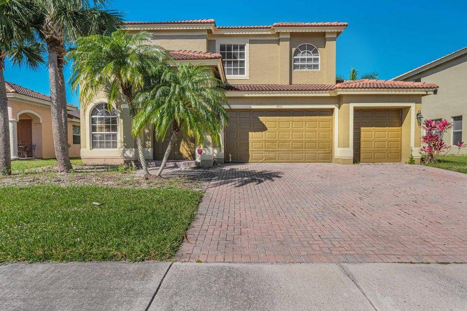 Spacious 5 bedroom, 3 bathroom two story home with a three car garage in Bent Creek community !