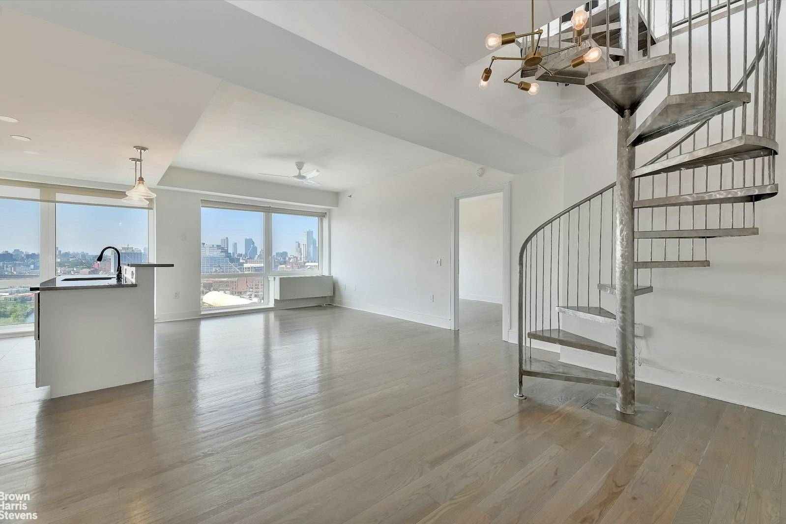 JUST LISTED ! STUNNING PENTHOUSE WITH ROOFTOP OASIS Discover this impeccably renovated 2 bedroom, 2 bathroom penthouse with a versatile loft 3rd bedroom.