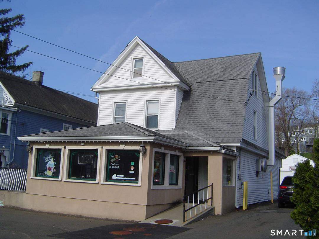 High Visibility Commercial Investment Opportunity Whitney Avenue Positioned in a heavily traveled corridor, this well maintained mixed use property offers strong, reliable income with upside potential.