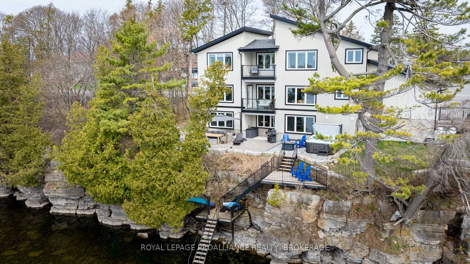 Welcome to your dream home on the shores of Lake Ontario where stunning design meets serene natural beauty.
