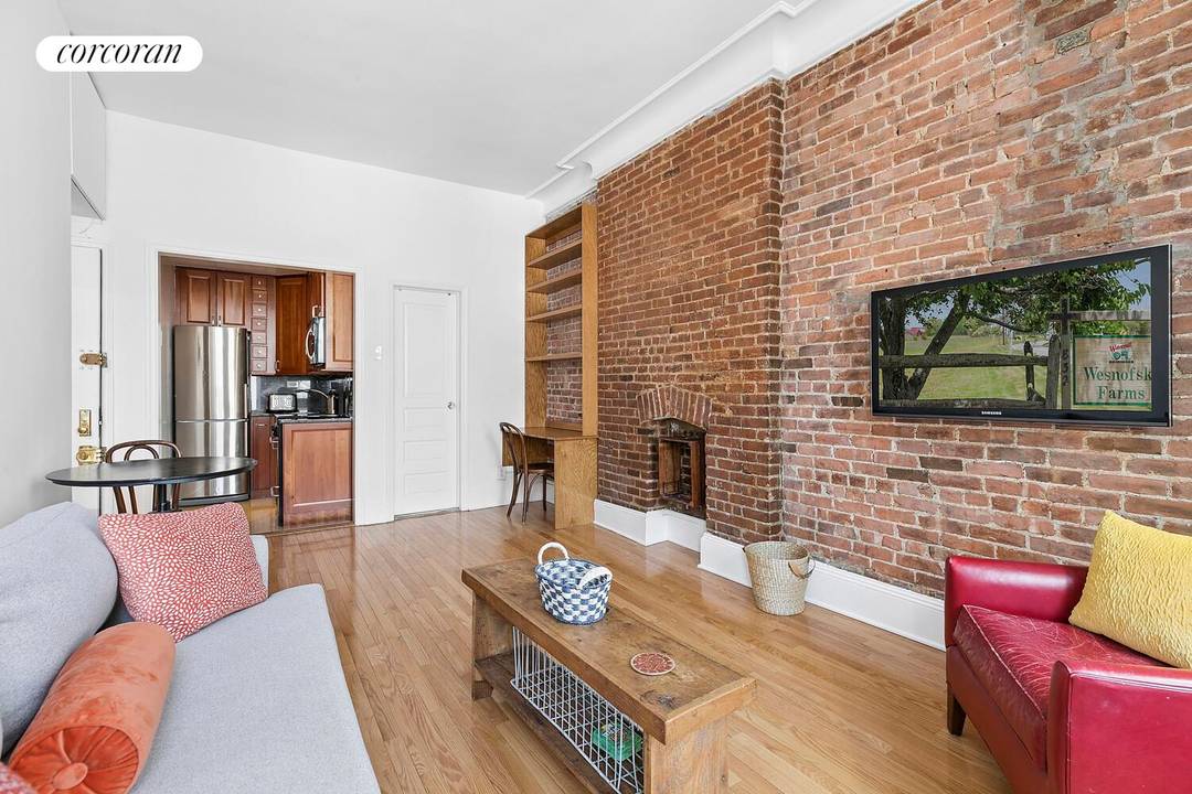 Ready for immediate move in, this charming turn of the century brownstone apartment has been freshly painted and thoughtfully updated throughout.