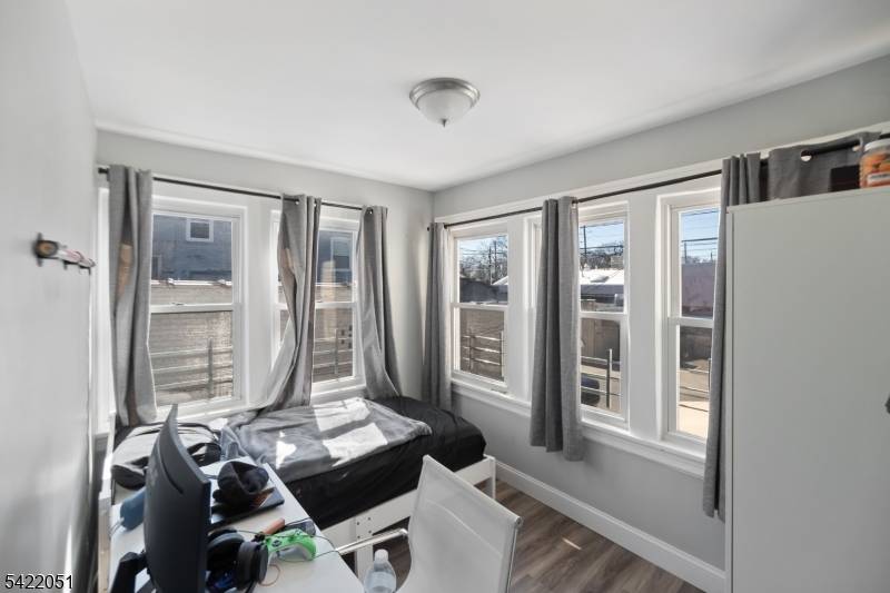 Well maintained two family home located in the desirable town of Bogota, just minutes from NYC.