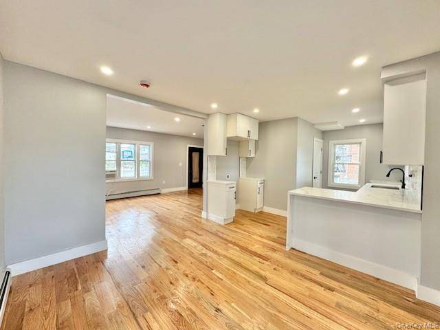 Welcome to this beautifully renovated detached Colonial situated on a spacious 40x100 corner lot in the heart of Saint Albans, Queens.