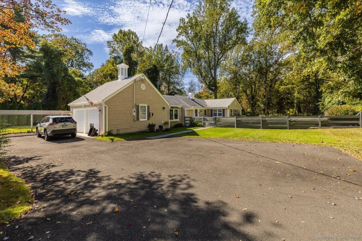 Beautifully expanded ranch set on 1.