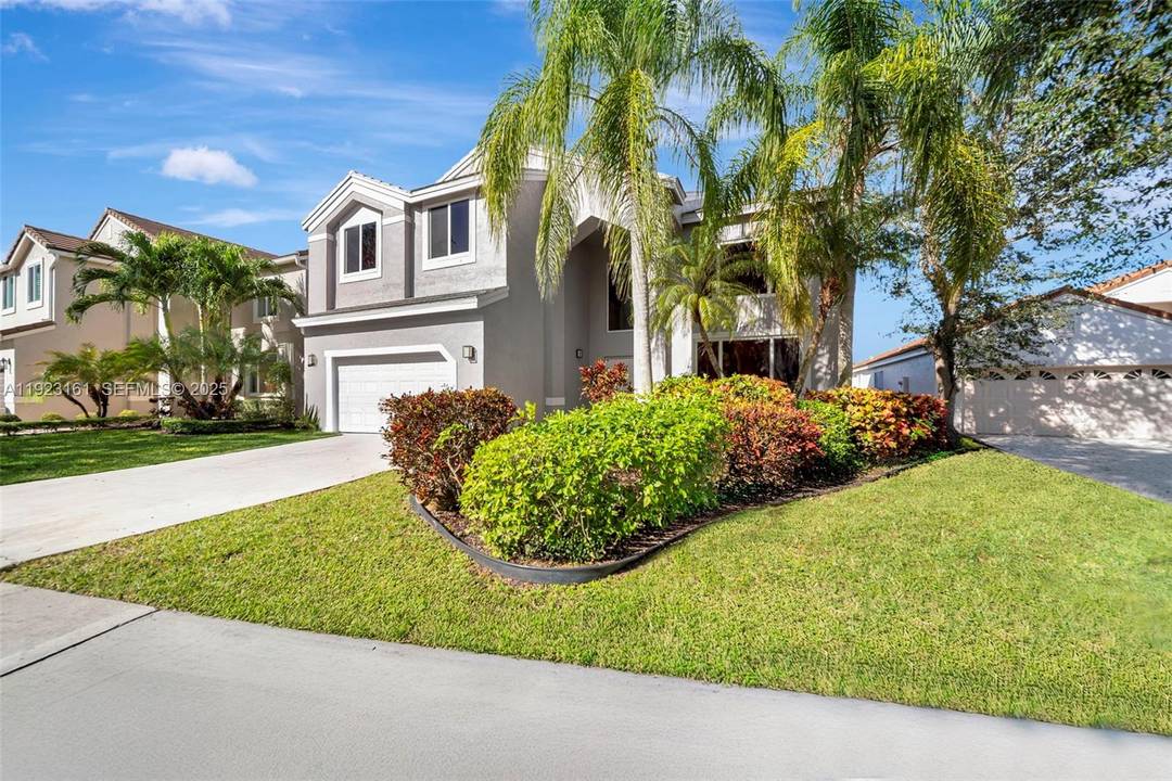 Fall in love with this stunning, fully remodeled pool home in The Lakes, one of Weston's most sought after gated communities.