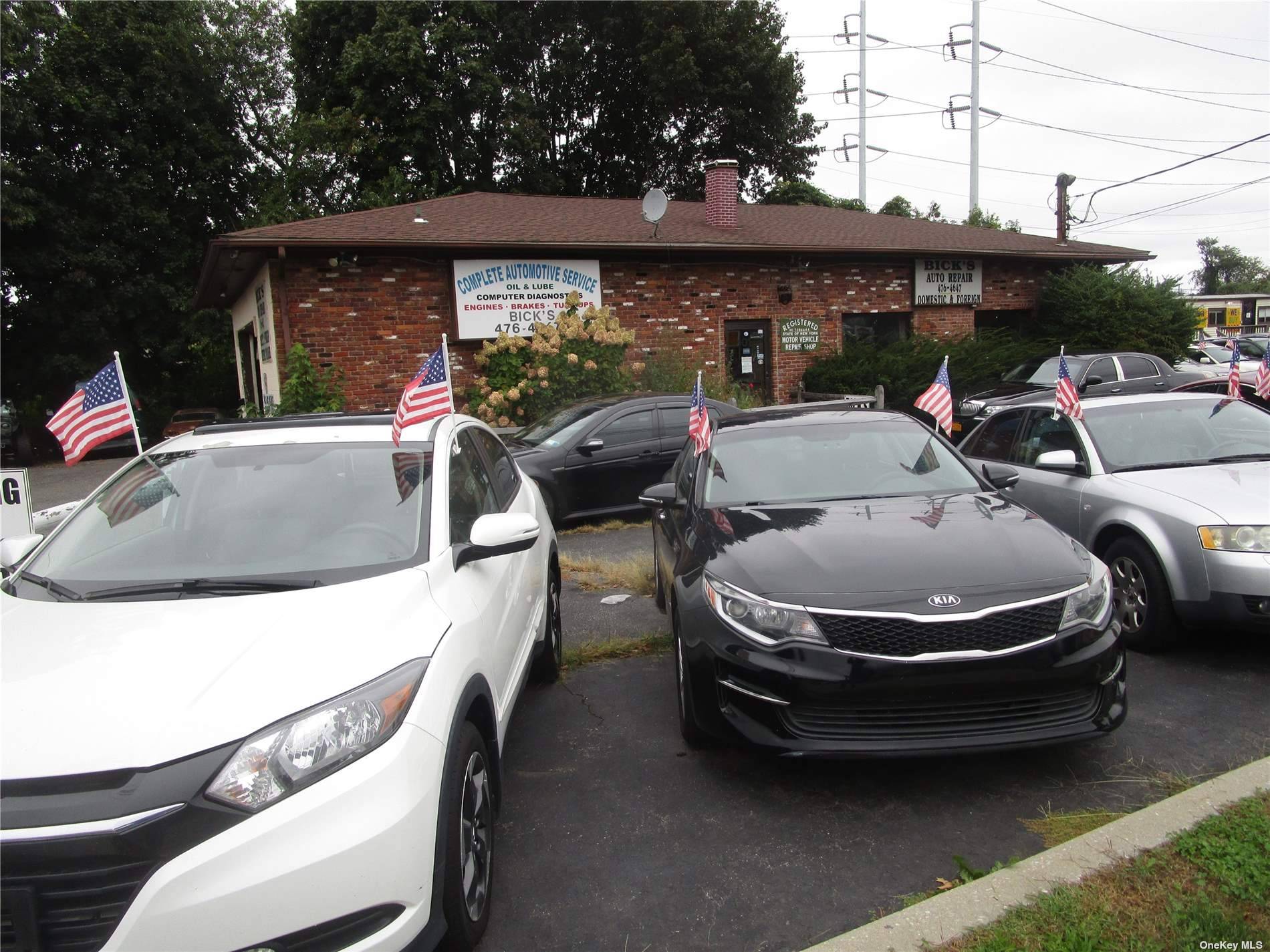 Currently in use as car lot.