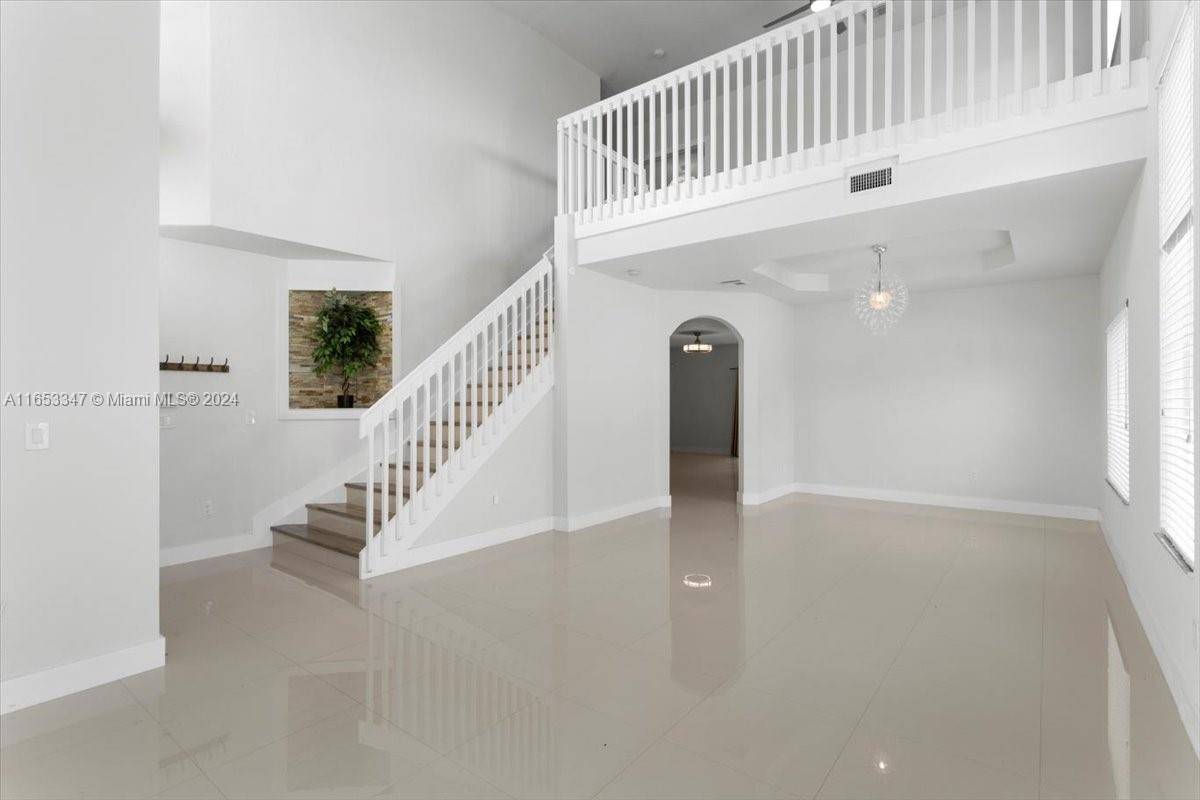Welcome to your dream home in the gated Isle of Bayshore at Lakes by the Bay !